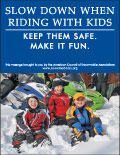 Vertical Poster of Snowmobilers and text ‘Slow Down When Riding With Kids. Keep Them Safe. Make it Fun.'